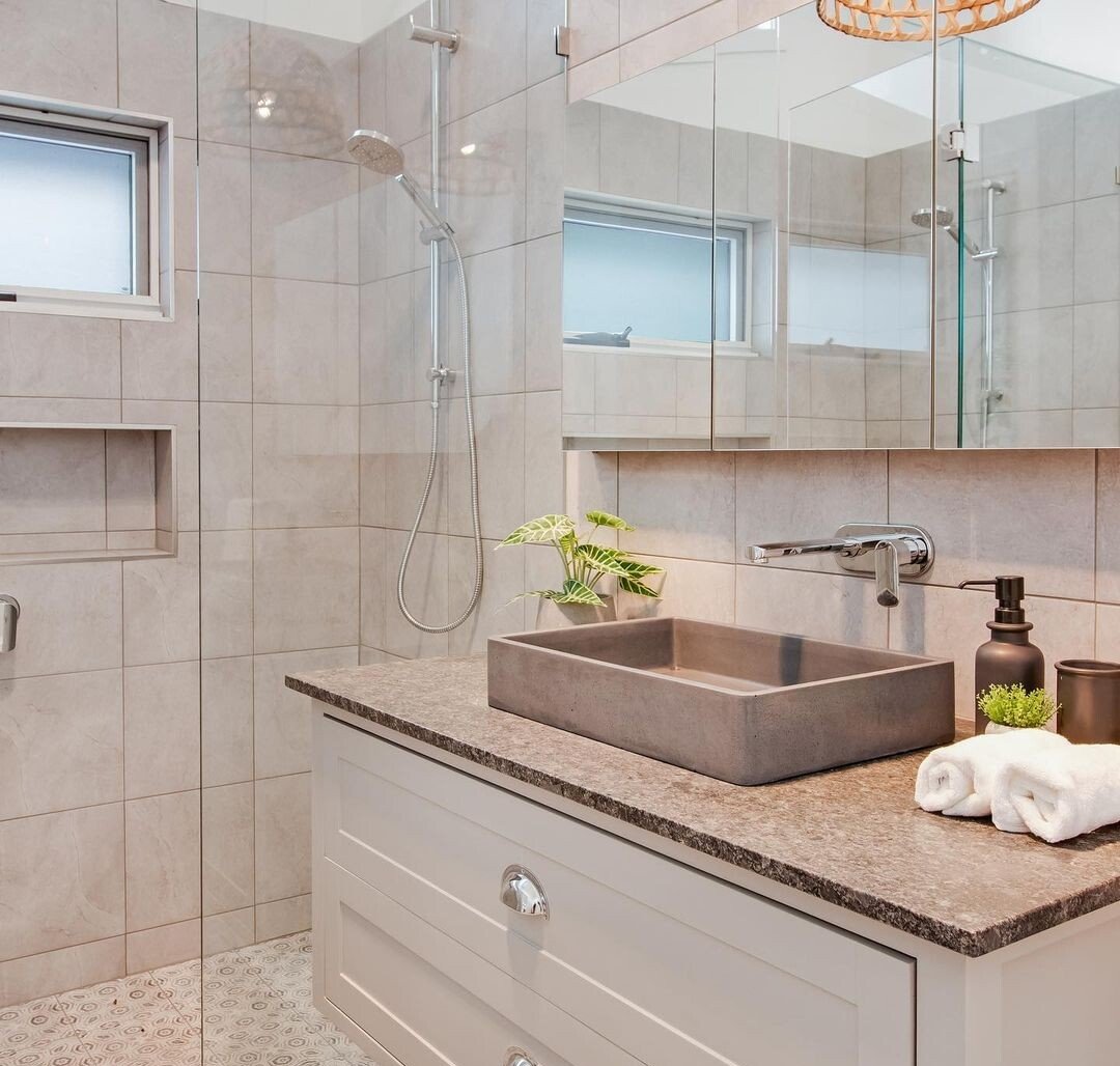 Modern kitchen plumbing and gas installation with light cabinetry.